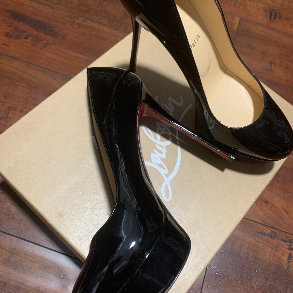 Authentic christian louboutin. Black leather.